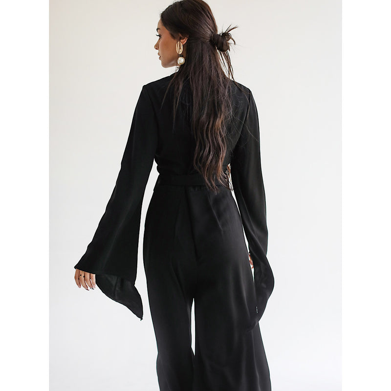 Black wide flare sleeve jumpsuit The Gallery