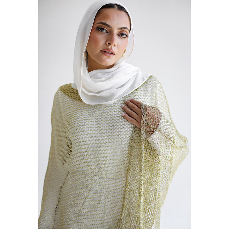 Glittering knit poncho