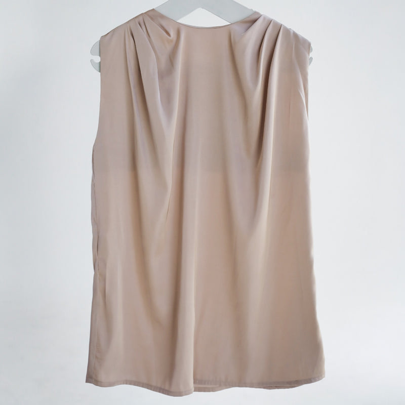 Sleeveless beige satin blouse