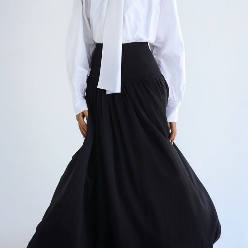 Black flowing pleated skirt