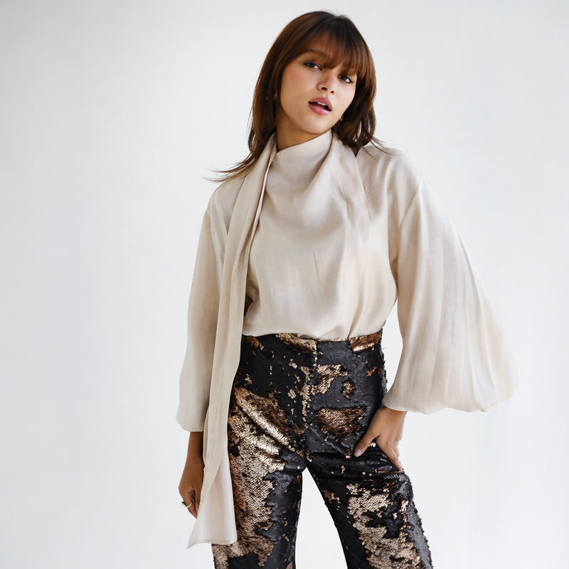 Draped high neck shimmering blouse