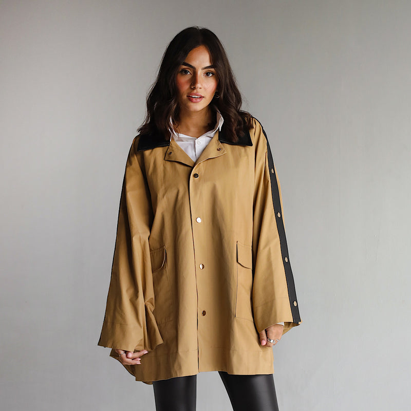 Beige buttoned poncho
