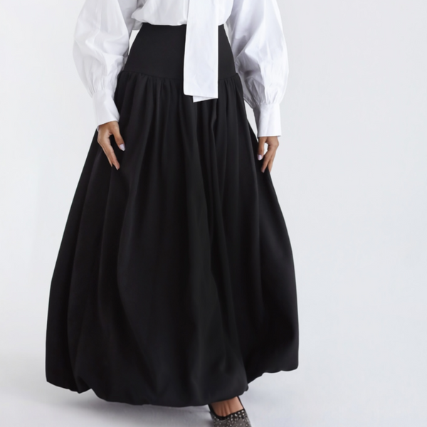Black flowing pleated skirt