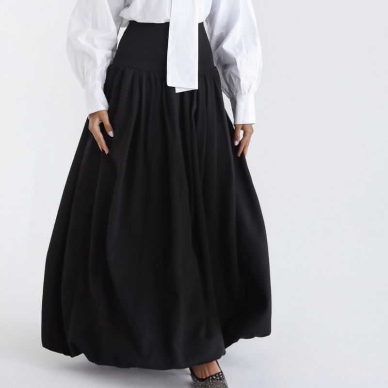 Black flowing pleated skirt