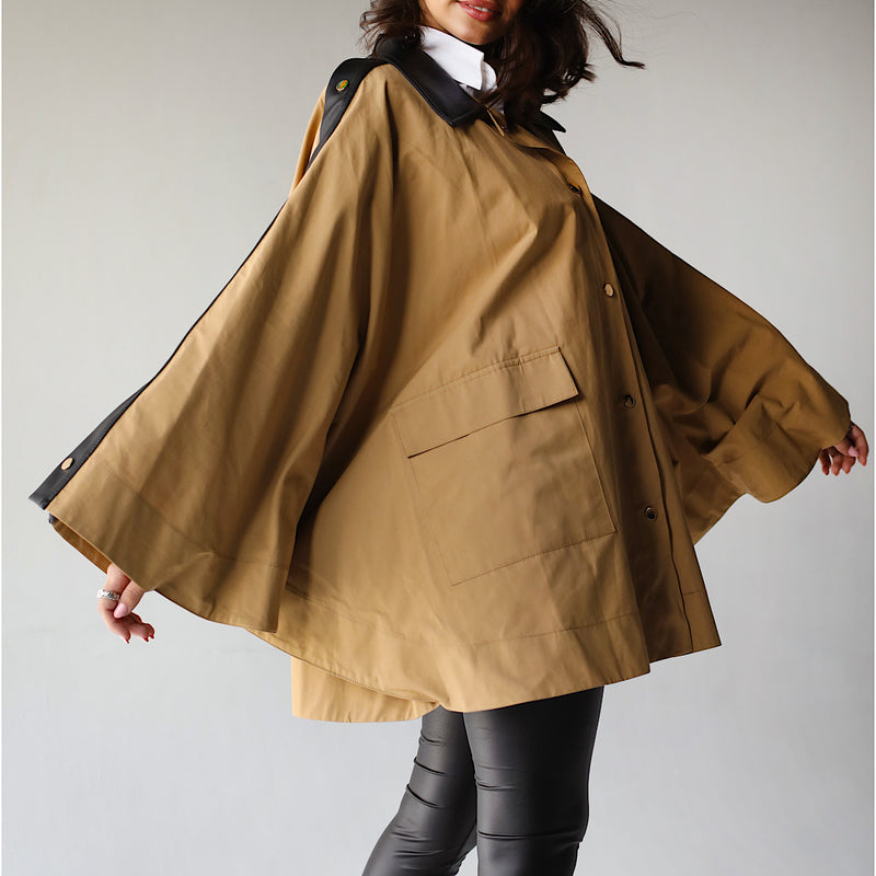 Beige buttoned poncho