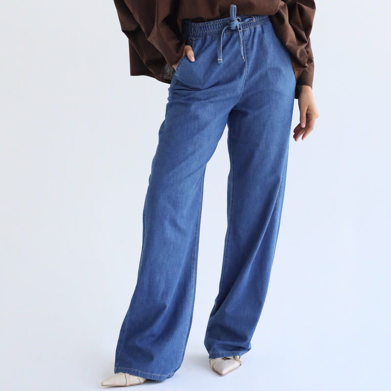 Mid wash blue elastic waist denim