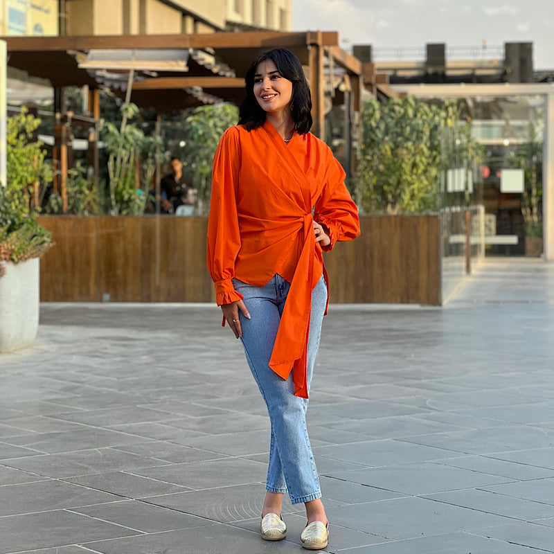 Orange side wrap blouse