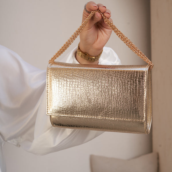 Gold quilted flap bag